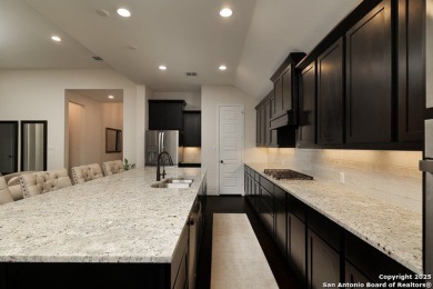 Step into luxury living at 24321 Downhill Lie, a stunning on TPC of San Antonio in Texas - for sale on GolfHomes.com, golf home, golf lot