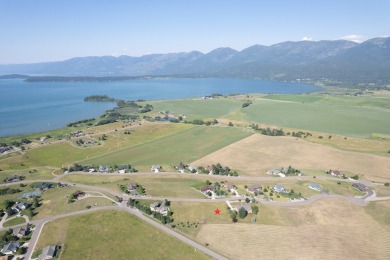 Discover your dream home site on .72 acres with breathtaking on Polson Bay Golf Course - Championship Course in Montana - for sale on GolfHomes.com, golf home, golf lot