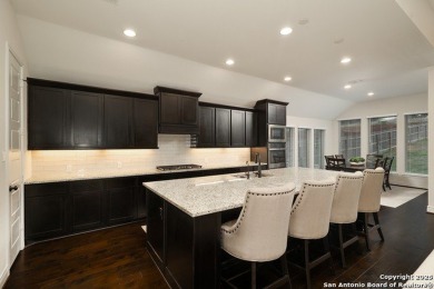 Step into luxury living at 24321 Downhill Lie, a stunning on TPC of San Antonio in Texas - for sale on GolfHomes.com, golf home, golf lot