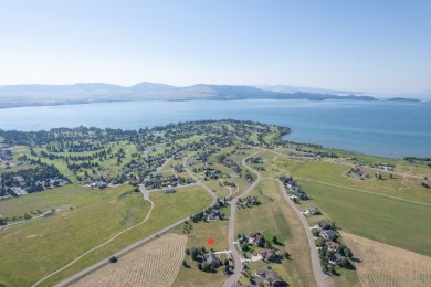 Discover your dream home site on .72 acres with breathtaking on Polson Bay Golf Course - Championship Course in Montana - for sale on GolfHomes.com, golf home, golf lot