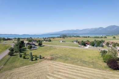 Discover your dream home site on .72 acres with breathtaking on Polson Bay Golf Course - Championship Course in Montana - for sale on GolfHomes.com, golf home, golf lot