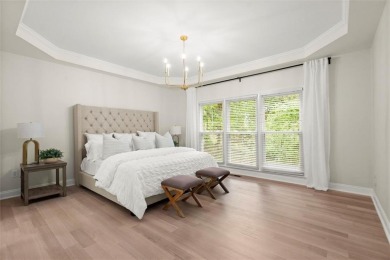 Experience refined living at 1010 Graystone Crossing, nestled in on The Golf Club of Georgia in Georgia - for sale on GolfHomes.com, golf home, golf lot