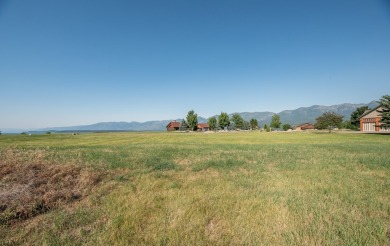 Discover your dream home site on .72 acres with breathtaking on Polson Bay Golf Course - Championship Course in Montana - for sale on GolfHomes.com, golf home, golf lot