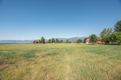 Discover your dream home site on .72 acres with breathtaking on Polson Bay Golf Course - Championship Course in Montana - for sale on GolfHomes.com, golf home, golf lot