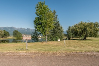 Discover your dream home site on .72 acres with breathtaking on Polson Bay Golf Course - Championship Course in Montana - for sale on GolfHomes.com, golf home, golf lot