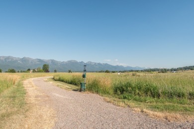 Discover your dream home site on .72 acres with breathtaking on Polson Bay Golf Course - Championship Course in Montana - for sale on GolfHomes.com, golf home, golf lot