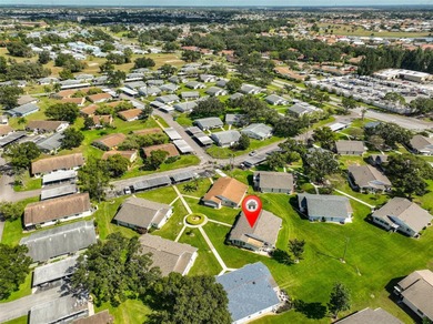 You'll fall in love with this delightful furnished one-bedroom on Falcon Watch Golf Club in Florida - for sale on GolfHomes.com, golf home, golf lot