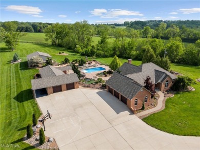 Discover a rare opportunity to own a refined, private estate on Green Valley Golf Club in Ohio - for sale on GolfHomes.com, golf home, golf lot