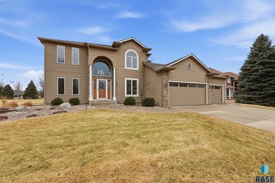 Beautiful two-story home located on the scenic Prairie Green on Prairie Green Golf Course in South Dakota - for sale on GolfHomes.com, golf home, golf lot