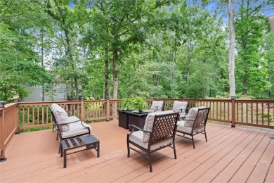 Experience refined living at 1010 Graystone Crossing, nestled in on The Golf Club of Georgia in Georgia - for sale on GolfHomes.com, golf home, golf lot