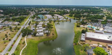 You'll fall in love with this delightful furnished one-bedroom on Falcon Watch Golf Club in Florida - for sale on GolfHomes.com, golf home, golf lot