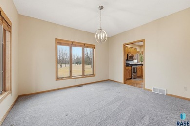 Beautiful two-story home located on the scenic Prairie Green on Prairie Green Golf Course in South Dakota - for sale on GolfHomes.com, golf home, golf lot