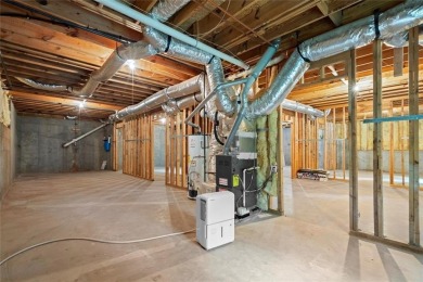 Experience refined living at 1010 Graystone Crossing, nestled in on The Golf Club of Georgia in Georgia - for sale on GolfHomes.com, golf home, golf lot