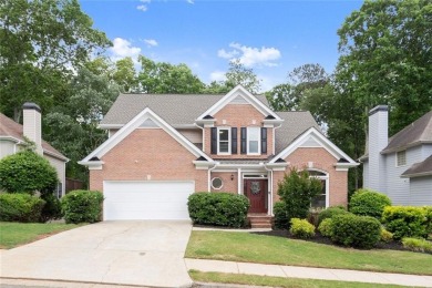 Experience refined living at 1010 Graystone Crossing, nestled in on The Golf Club of Georgia in Georgia - for sale on GolfHomes.com, golf home, golf lot