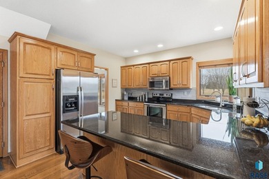 Beautiful two-story home located on the scenic Prairie Green on Prairie Green Golf Course in South Dakota - for sale on GolfHomes.com, golf home, golf lot