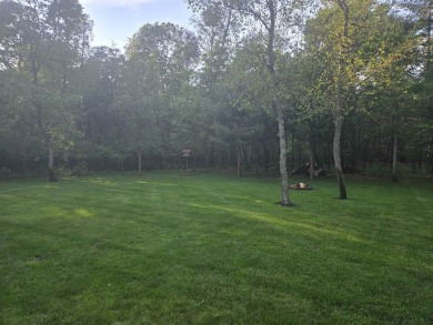 Gorgeous Log Cabin in highly desired location.  Deeded Access to on Northern Bay Golf Resort and Marina in Wisconsin - for sale on GolfHomes.com, golf home, golf lot