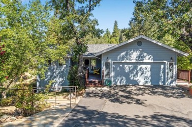 Nestled in the serene embrace of nature, this exquisite home in on Forest Meadows Golf Course in California - for sale on GolfHomes.com, golf home, golf lot