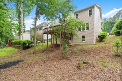 Experience refined living at 1010 Graystone Crossing, nestled in on The Golf Club of Georgia in Georgia - for sale on GolfHomes.com, golf home, golf lot