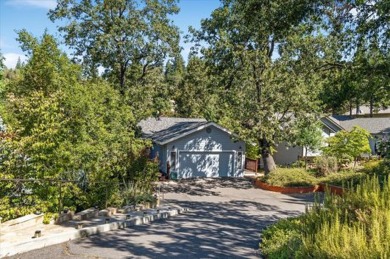 Nestled in the serene embrace of nature, this exquisite home in on Forest Meadows Golf Course in California - for sale on GolfHomes.com, golf home, golf lot