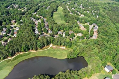 Experience refined living at 1010 Graystone Crossing, nestled in on The Golf Club of Georgia in Georgia - for sale on GolfHomes.com, golf home, golf lot