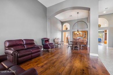 Perched atop a scenic hill in the prestigious Oro Valley Heights on Oro Valley Country Club in Arizona - for sale on GolfHomes.com, golf home, golf lot