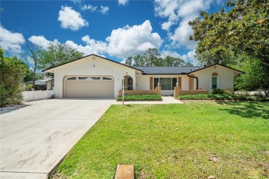 Welcome to this stunning 3-bedroom, 2-bathroom home with over 2 on The Grand Club - Pine Lakes Course in Florida - for sale on GolfHomes.com, golf home, golf lot