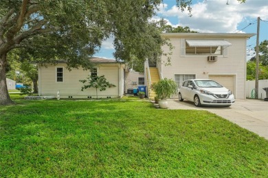 Under contract-accepting backup offers. Unique on Mangrove Bay Golf Course in Florida - for sale on GolfHomes.com, golf home, golf lot