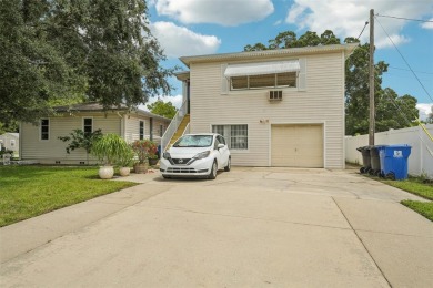 Under contract-accepting backup offers. Unique on Mangrove Bay Golf Course in Florida - for sale on GolfHomes.com, golf home, golf lot