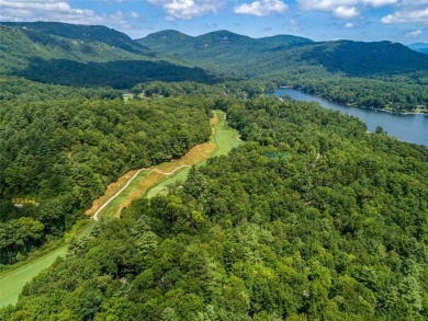 Nestled between holes 11 and 12 of Lake Toxaway Country Club's on Lake Toxaway Country Club in North Carolina - for sale on GolfHomes.com, golf home, golf lot