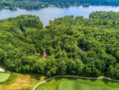 Nestled between holes 11 and 12 of Lake Toxaway Country Club's on Lake Toxaway Country Club in North Carolina - for sale on GolfHomes.com, golf home, golf lot