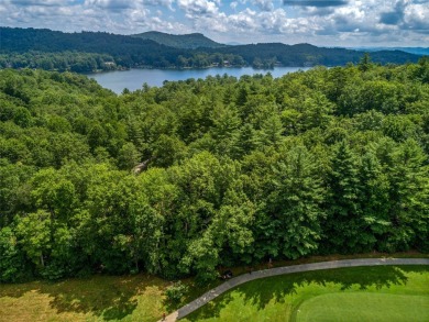 Nestled between holes 11 and 12 of Lake Toxaway Country Club's on Lake Toxaway Country Club in North Carolina - for sale on GolfHomes.com, golf home, golf lot