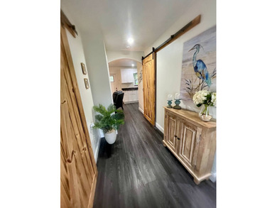 Come see custom built truss roof exec suite with Hardie board on The Great Outdoors Golf and Country Club in Florida - for sale on GolfHomes.com, golf home, golf lot