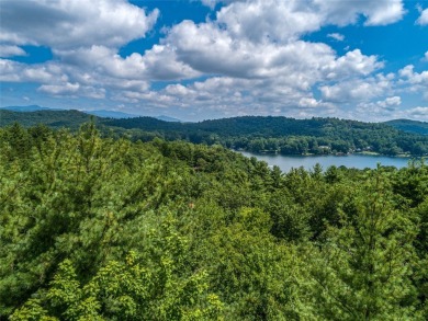 Nestled between holes 11 and 12 of Lake Toxaway Country Club's on Lake Toxaway Country Club in North Carolina - for sale on GolfHomes.com, golf home, golf lot