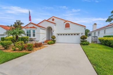Elegant Mediterranean Sanctuary in Clearwater's Prestigious on Feather Sound Country Club in Florida - for sale on GolfHomes.com, golf home, golf lot