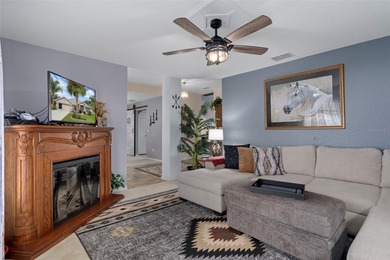 Exquisite 3 Bedroom, 3 Bathroom Pool Home Overlooking The Golf on Sherman Hills Golf Club in Florida - for sale on GolfHomes.com, golf home, golf lot