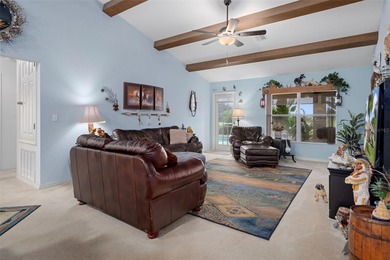 Exquisite 3 Bedroom, 3 Bathroom Pool Home Overlooking The Golf on Sherman Hills Golf Club in Florida - for sale on GolfHomes.com, golf home, golf lot