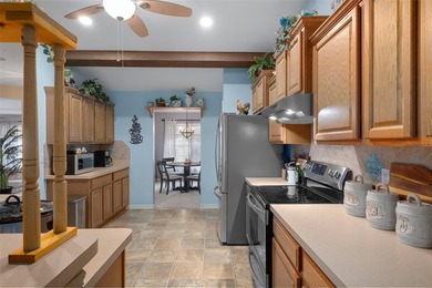 Exquisite 3 Bedroom, 3 Bathroom Pool Home Overlooking The Golf on Sherman Hills Golf Club in Florida - for sale on GolfHomes.com, golf home, golf lot