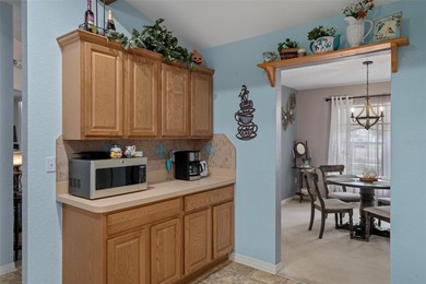 Exquisite 3 Bedroom, 3 Bathroom Pool Home Overlooking The Golf on Sherman Hills Golf Club in Florida - for sale on GolfHomes.com, golf home, golf lot