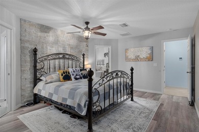 Exquisite 3 Bedroom, 3 Bathroom Pool Home Overlooking The Golf on Sherman Hills Golf Club in Florida - for sale on GolfHomes.com, golf home, golf lot