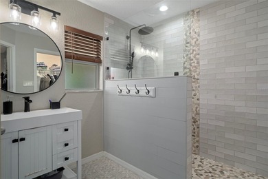 Exquisite 3 Bedroom, 3 Bathroom Pool Home Overlooking The Golf on Sherman Hills Golf Club in Florida - for sale on GolfHomes.com, golf home, golf lot