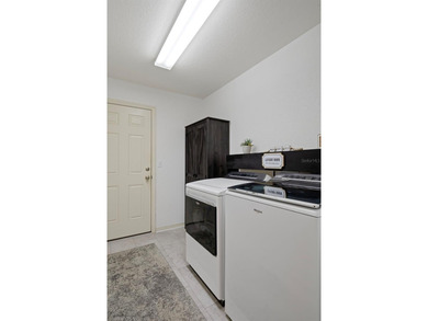 LUXURY 4-BEDROOM, 3-BATH POOL HOME WITH JET SWIM SYSTEM AND GOLF on Sherman Hills Golf Club in Florida - for sale on GolfHomes.com, golf home, golf lot