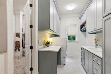 Experience refined living in this thoughtfully designed custom on Money Hill Golf and Country Club in Louisiana - for sale on GolfHomes.com, golf home, golf lot