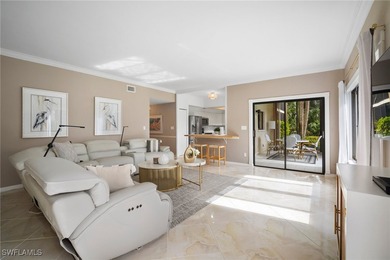 Experience the ultimate Pelican Bay lifestyle in this on Club at Pelican Bay Golf Course in Florida - for sale on GolfHomes.com, golf home, golf lot