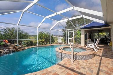 Exquisite 3 Bedroom, 3 Bathroom Pool Home Overlooking The Golf on Sherman Hills Golf Club in Florida - for sale on GolfHomes.com, golf home, golf lot