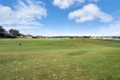 Exquisite 3 Bedroom, 3 Bathroom Pool Home Overlooking The Golf on Sherman Hills Golf Club in Florida - for sale on GolfHomes.com, golf home, golf lot