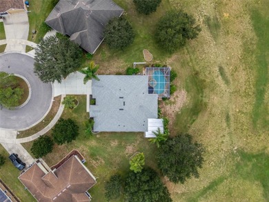 Exquisite 3 Bedroom, 3 Bathroom Pool Home Overlooking The Golf on Sherman Hills Golf Club in Florida - for sale on GolfHomes.com, golf home, golf lot