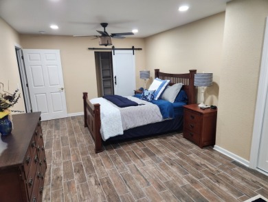 Beautifully remodeled four-bedroom home with a three-car garage on Tellico Village -The Links At Kahite Golf Course in Tennessee - for sale on GolfHomes.com, golf home, golf lot