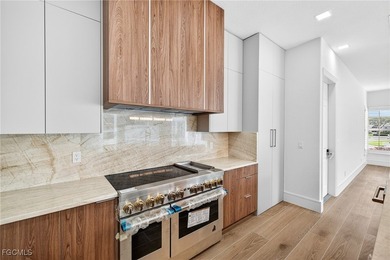 Experience refined luxury living in this freshly remodeled Wyman on Gulf Harbour Yacht and Country Club in Florida - for sale on GolfHomes.com, golf home, golf lot