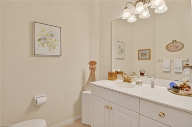 ELEVATE YOURSELF into this lovely second-floor coach home in on Pelican Marsh Golf Club in Florida - for sale on GolfHomes.com, golf home, golf lot