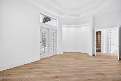 Experience refined luxury living in this freshly remodeled Wyman on Gulf Harbour Yacht and Country Club in Florida - for sale on GolfHomes.com, golf home, golf lot